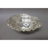 A Victorian silver shaped circular bonbon bowl, with pierced and embossed decoration,
