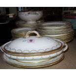 Mintons England; a part dinner service including a tureen and cover, another tureen lacking cover,