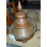 A late 19th century copper street lantern, with tapering spire and pierced castellated rim,