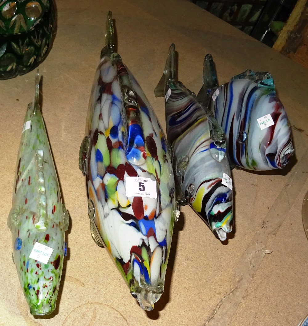 Four Murano style 20th century art glass figures of fish in varying sizes, the largest 54cm wide,