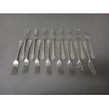 Sixteen silver double struck Old English and thread pattern dessert forks, London 1913,