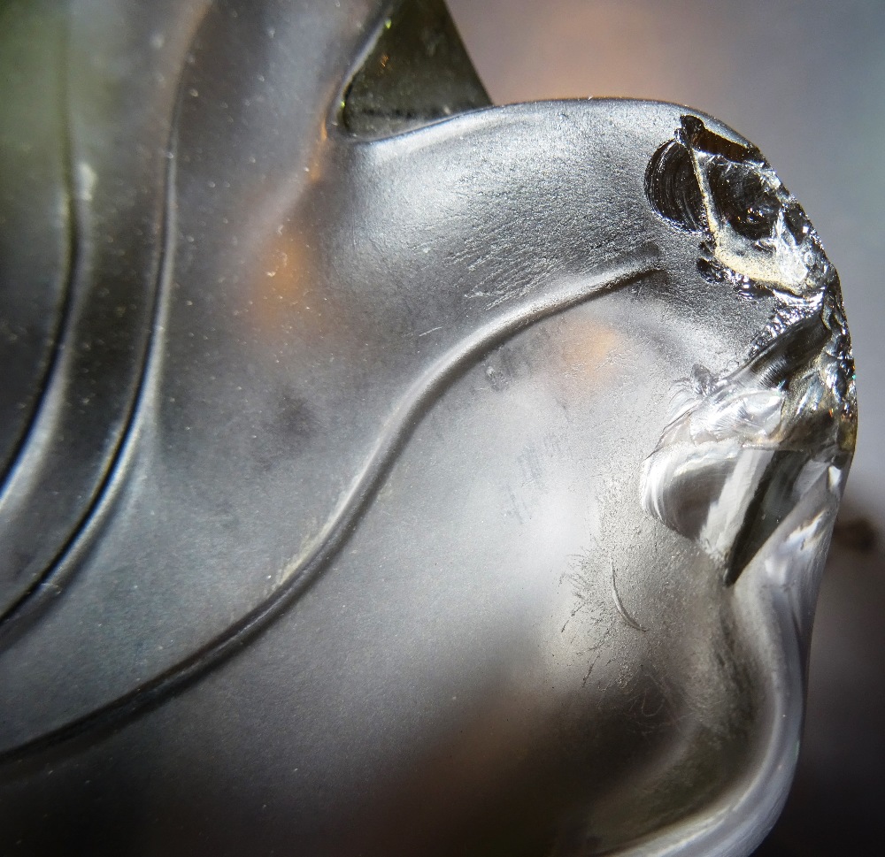 A Lalique bowl, decorated with floral rim, 'Lalique France' etched to base, 31cm dia. - Image 2 of 2