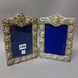 A late Victorian silver mounted shaped rectangular double photograph frame,