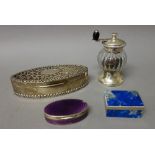 A silver pot pourri box, of oval form with pierced decoration to the hinged lid,