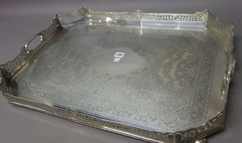 A late Victorian silver large cut cornered rectangular twin handled gallery tray,