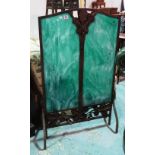 A French Art Nouveau wrought iron fire screen with inset faux hardstone panels,