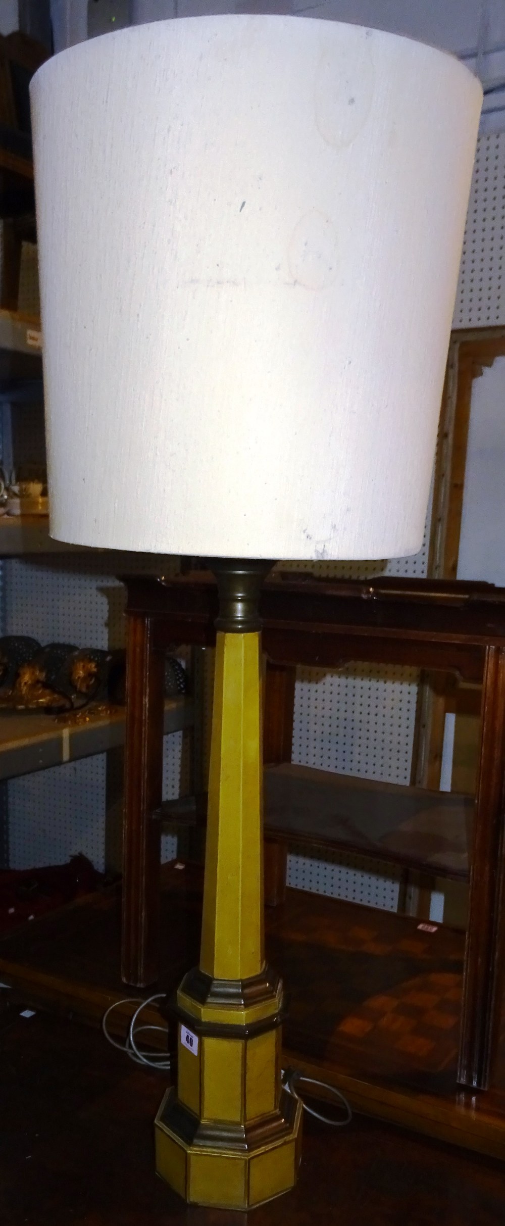 An early 20th century Empire style metal painted table lamp, 71cm high.