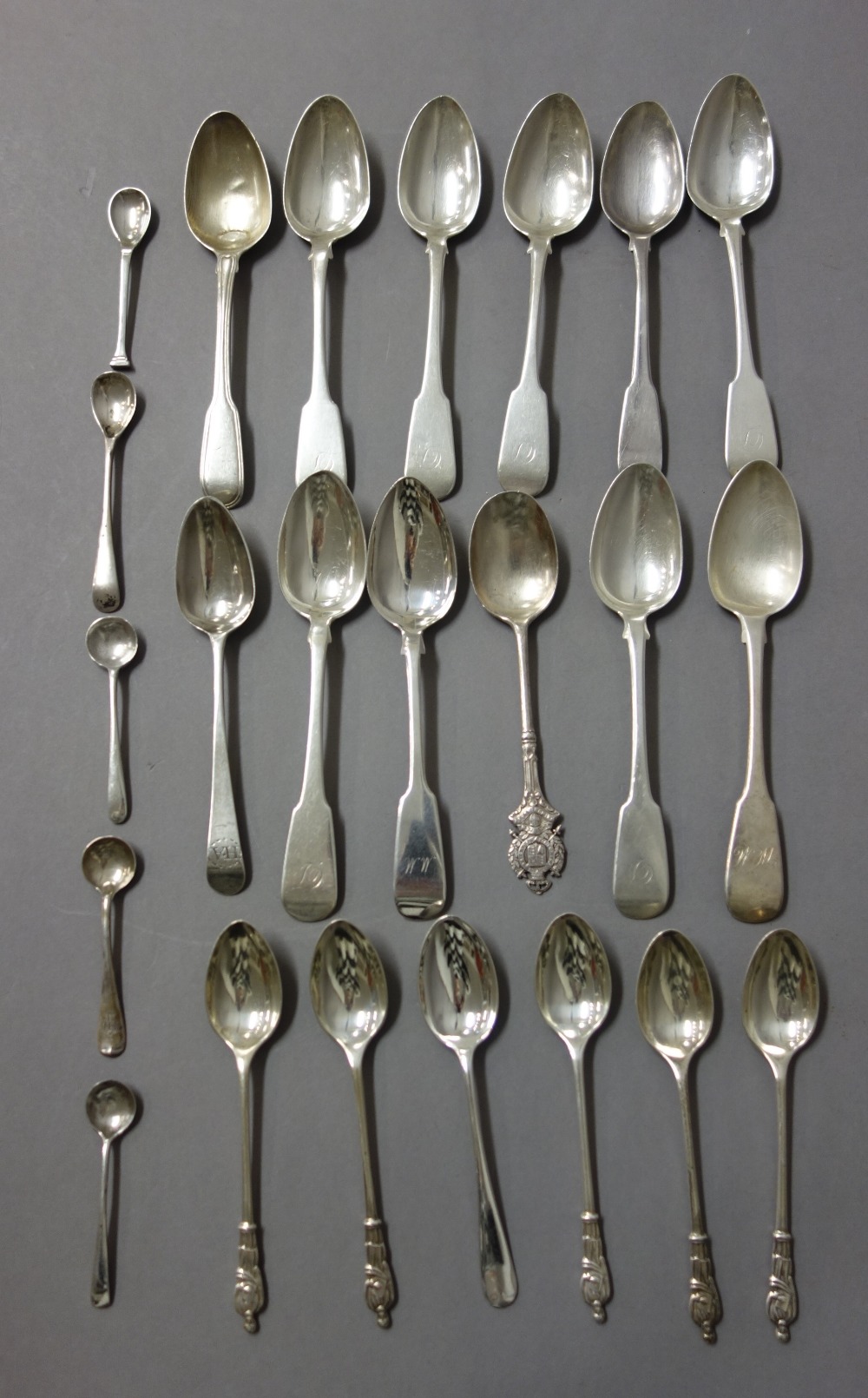 Silver, comprising; eight Scottish fiddle pattern teaspoons, five figure terminal teaspoons,