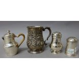 A George II silver mug, of baluster form, with later floral and foliate embossed decoration,