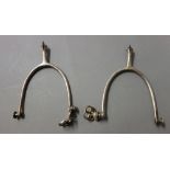 A pair of silver horse riding spurs,