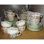 A Minton tea and coffee service, decorated with Haddon Hall pattern, (qty).