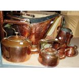 Copper wares, including; a bucket with swing over handle, two kettles, a plate,