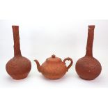 A pair of Japanese terracotta bottle vas