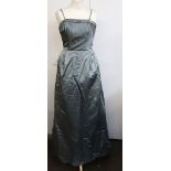 A grey evening dress with button detail,