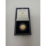 An Elizabeth II proof half sovereign 1998, with a Royal Mint case and certificate card.