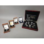 A collection of modern collector's coinage, including; five miniature gold coins,