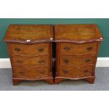 A pair of 20th century figured walnut and mahogany serpentine bedside cupboards,
