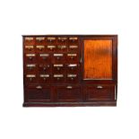 A Victorian mahogany apothecary cabinet, with twenty-five various drawers and cupboard,