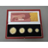 A United Kingdom Britannia gold proof four coin set, 2003, with a Royal Mint case and certificate.