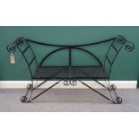 A pair of Regency style black painted wrought iron scroll end garden benches, with slatted seat,