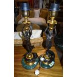 A pair of 20th century bronze lamps, each with figural angel column,