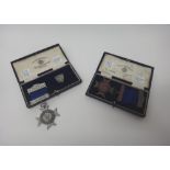 A silver cruciform medal detailed John Thompson (Wolverhampton) Ltd, and engraved to the back B.