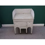 A George III later grey painted galleried washstand, on tapering square supports,