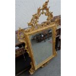 A North Italian giltwood mirror in the Rococo style,