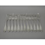 Twelve Irish silver fiddle pattern table forks, comprising; eight Dublin 1800 and four Dublin 1801,