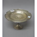 A silver pedestal comport, having a shaped rim, raised on a trumpet shaped foot, Sheffield 1922,