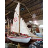 'Colin Archer', a large 20th century plastic and wooden pond yacht, with motor,