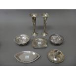 Silver, comprising; a pair of bonbon dishes, each of circular form, with pierced decoration,