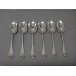 Six silver bottom marked Hanoverian pattern dessert spoons,