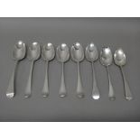 Six silver bottom marked 18th century Hanoverian pattern table spoons, two having engraved dates,
