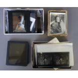 A quantity of magic lantern slides and glass photographic plates,