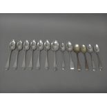 Silver flatware, comprising; a set of six grapefruit spoons, Sheffield 1933, three Irish teaspoons,