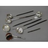 A collection of six toddy and punch ladles,