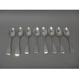 Eight Irish silver fiddle pattern tablespoons, Dublin, comprising; one 1817, one 1819 and six 1820,