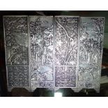 A set of four Chinese white metal plaques in the form of a table screen, each 4.