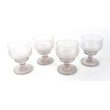 A set of four early 19th century glass rummers, the ogee shape bowls diamond and facet cut,