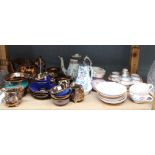 A collection of Victorian and later copper lustre tea wares, twenty pieces,
