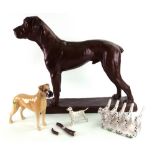M de S, a bronzed plaster figure of a gun dog, standing on a rectangular base, 48cm wide,