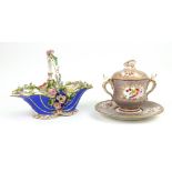 A Spode two-handled cup, cover and stand, circa 1820, painted with flower panels,