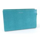 An Aspinal of London turquoise clutch bag,