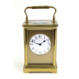 Goldsmiths & Silversmiths Company: a large brass cased carriage clock,