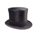 A black silk top hat, by Lock & Co, and a cylindrical cardboard hat box (2).