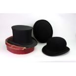 A folding black silk opera hat, in original cardboard case, and two bowler hats,