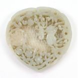 A Chinese pale celadon jade plaque, 19th/20th century, of heart shape,