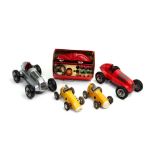 A collection of five Schuco toy cars including the 3000,