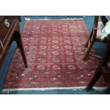 An Afghan Ersari rug, on a red field, 177 x 132cm.